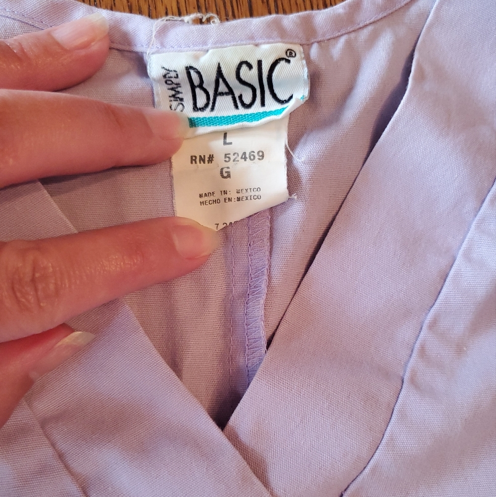 Light purple scrub top